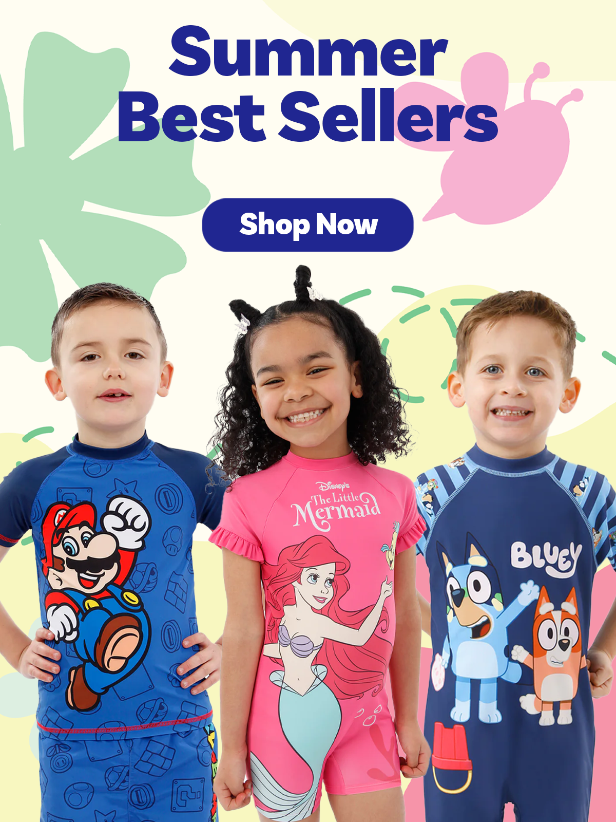 Summer Best Sellers - Shop Now. 2 young boys and a young girl wearing Swim Sets. 1 Boys Bluey Surfsuit, 1 Boys Super Mario Swim Set and 1 Girls Disneys The Little Mermaid Surfsuit.